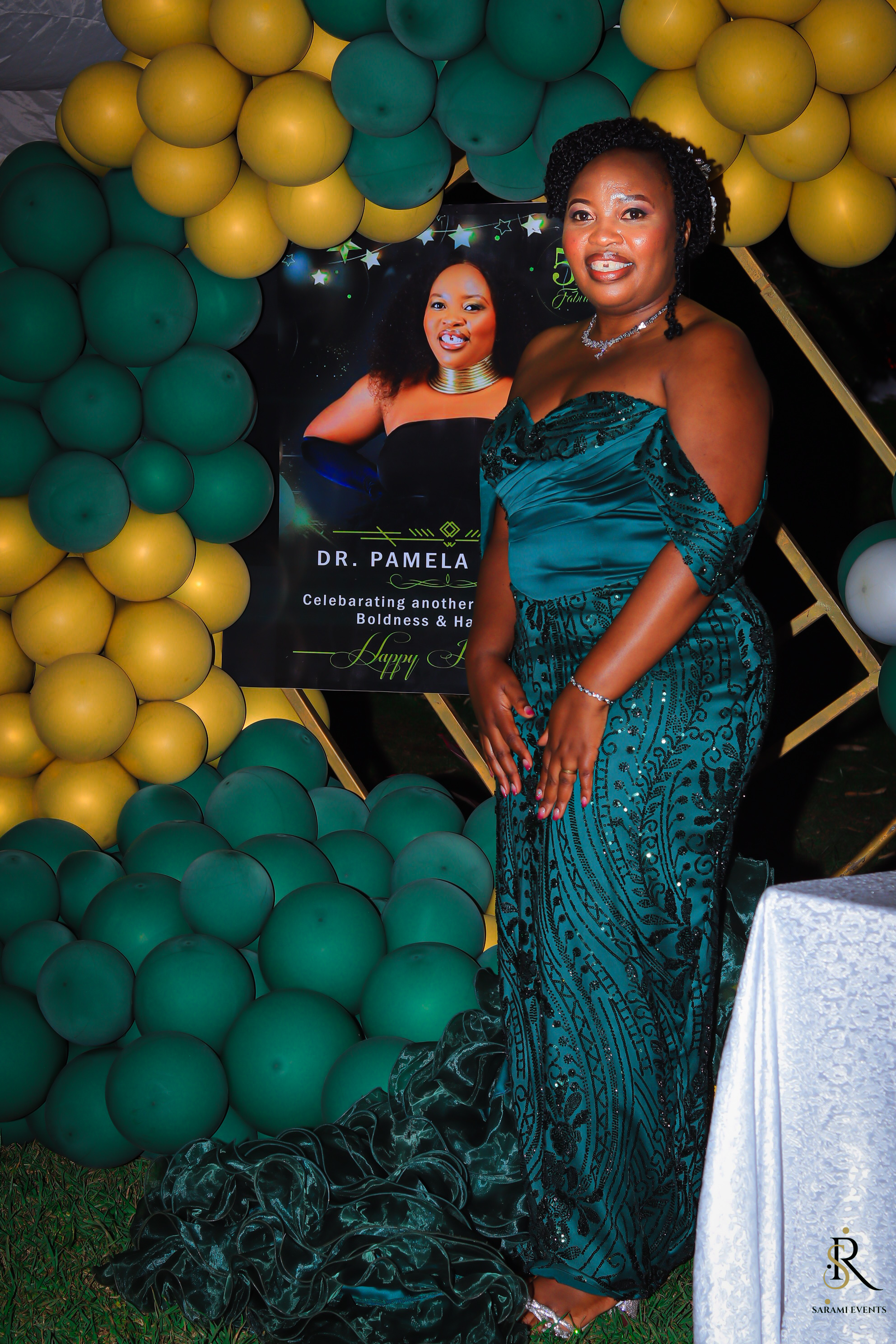 Happy African family celebrating a child's birthday party at home